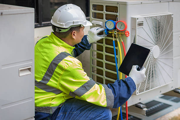 Professional Emergency Ac Repair technician working in Alden, NY